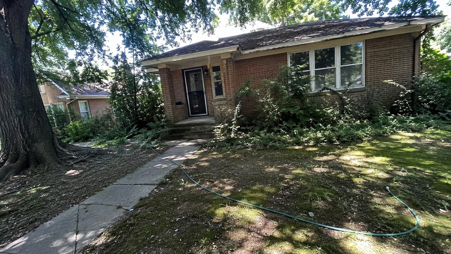 Shaded bungalow before the redesign